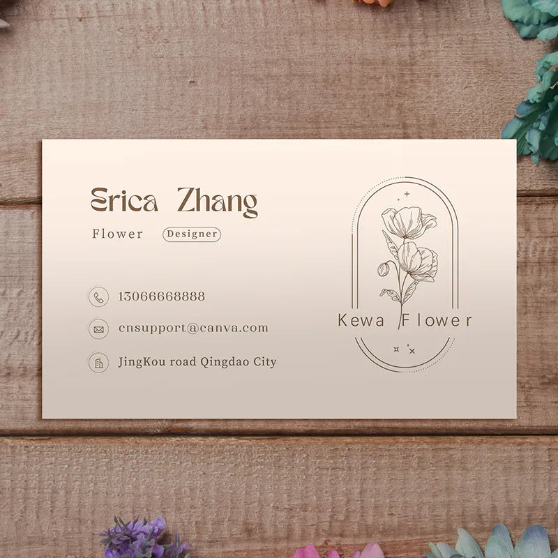 Elegant business card design featuring Erica Zhang, a flower designer, with contact details and floral illustration.