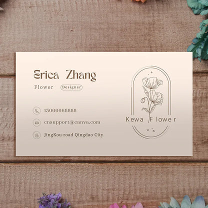 Elegant business card design featuring Erica Zhang, a flower designer, with contact details and floral illustration.