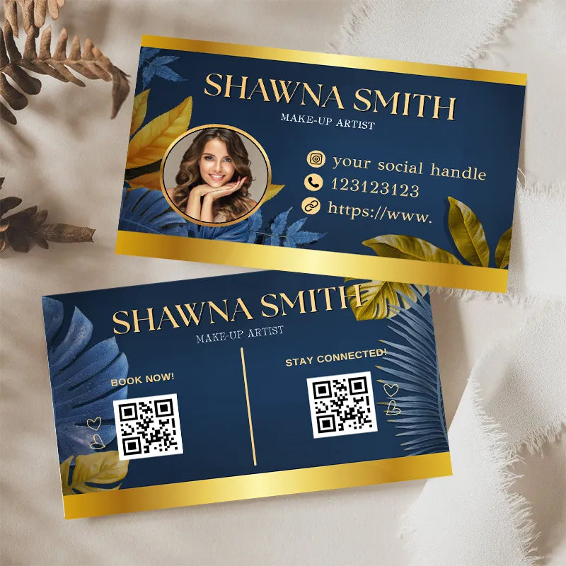 High-end glossy business cards featuring a make-up artist design with tropical leaves and QR codes.