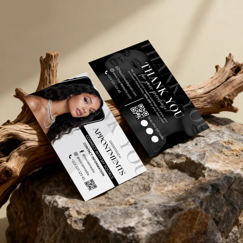 The back of the hair business card, showing the blank, uncoated surface ready for handwriting notes.