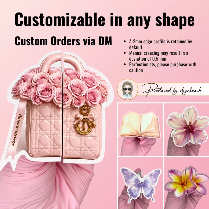 Printed handbag business cards featuring a pink rose-filled bag, an open handbag design and a luggage-themed example.