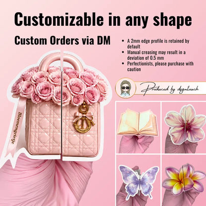 Printed handbag business cards featuring a pink rose-filled bag, an open handbag design and a luggage-themed example.