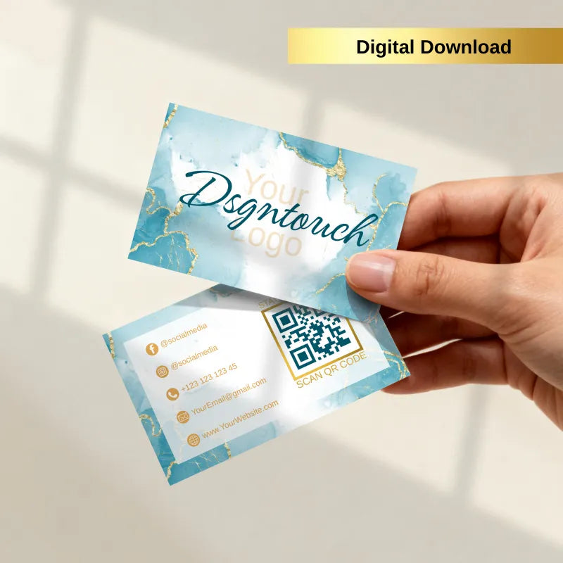 Hand holding a light blue and gold marble texture business card mockup, front side displays "Your Dsgntouch Logo" with elegant calligraphy, digital download product.