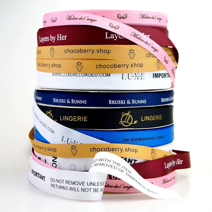 Custom printed ribbon assortment for brands: includes designs for "chocoberry.shop," "Bruski & Bunn," "Lingerie," and more, with varied color & text styles.
