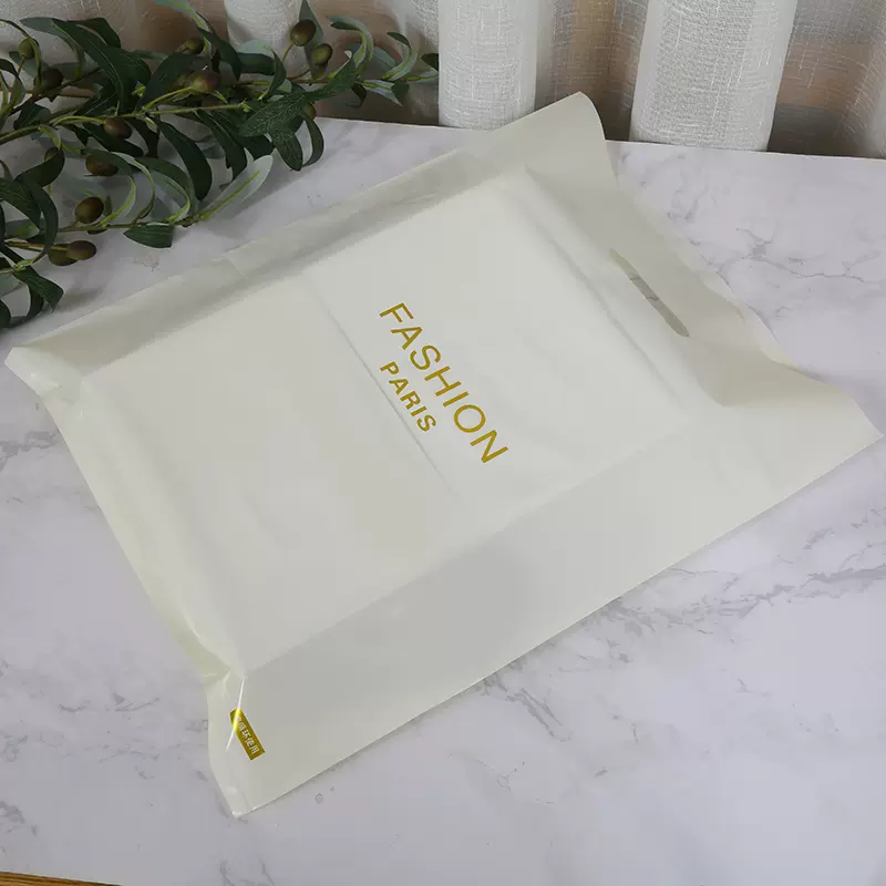 DsgnTouch Clothing store bags 50 pcs per pack customized printed logo plastic bags cosmetic gift packaging bags women children's handheld shopping bags customized