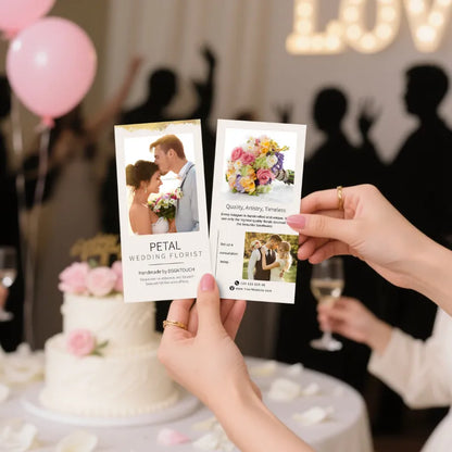 Printed wedding card featuring floral design and wedding couple, showcased at a reception by DSGNTOUCH.