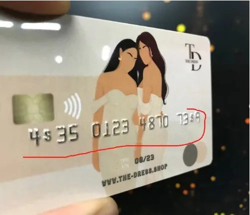 Membership card for "THE DRESS SHOP" featuring a contactless chip, printed number (4835 0123 4870 7369), and expiration date (08/23).