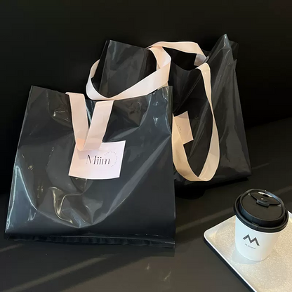 DsgnTouch High-grade clothing store handbags for clothes with plastic bags women's gift packaging shopping bags customized wholesale